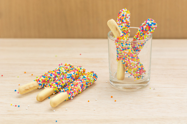 Sweet bread sticks sprinkled sugar candy that kids love. - Photo, Image