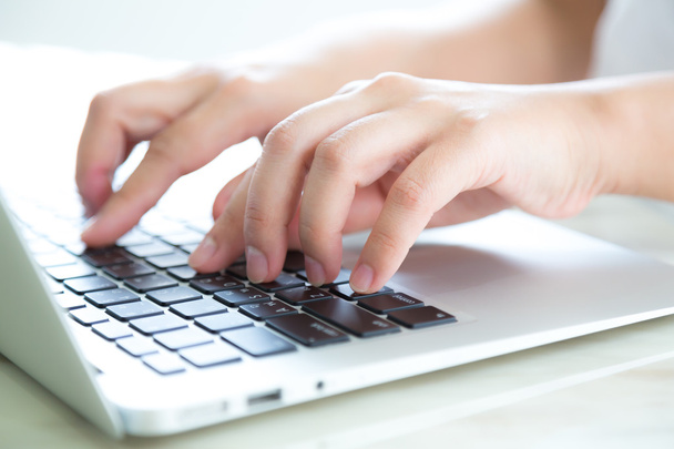 Closeup of business woman hand typing on laptop keyboard - Photo, Image