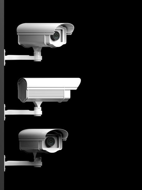 Three security surveillance cameras side view isolated on black background - Photo, Image