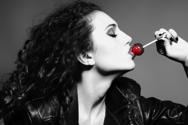 Pretty girl with lollipop - Photo, Image