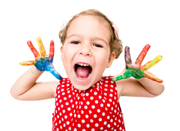 Positive child with colorful hands - Фото, зображення