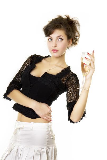 Girl model with a glass of champagne - 写真・画像