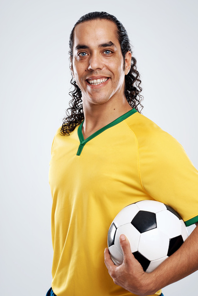 smiling brasil football soccer player - Foto, imagen