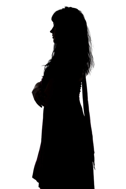 Photo of curvy woman's silhouette in profile - Фото, зображення