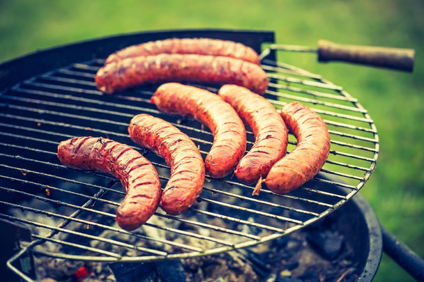 tasty polish sausage on grill - Photo, Image