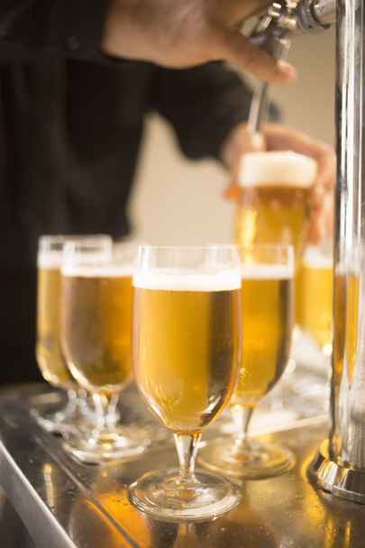 Lager draft beer glasses pump in restaurant bar - Photo, Image