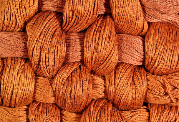 Brown twisted skeins of floss as background texture  - Photo, Image