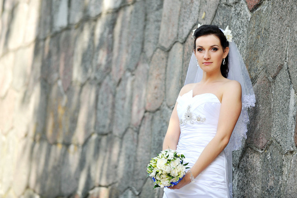 Bride with flowers - Фото, изображение