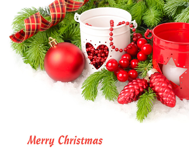 Red Christmas ball both red and white candlesticks on a white background. A Christmas background with a place for the text. - Photo, image