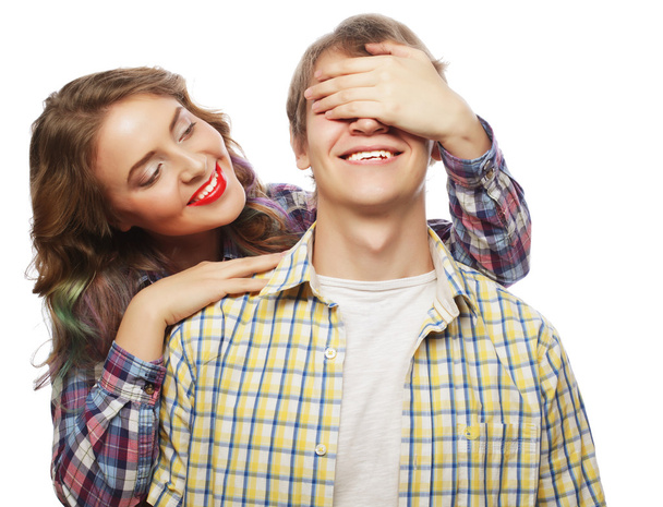 Young woman closing his boyfriend eyes. - Φωτογραφία, εικόνα
