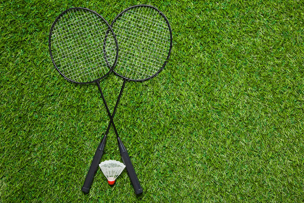 Crossed badminton rackets with shuttlecock  - Φωτογραφία, εικόνα