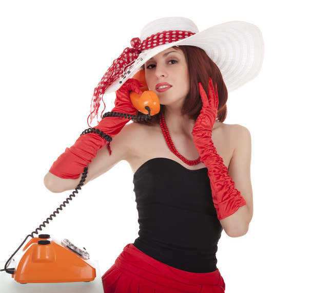 Fashion girl in retro style with vintage phone - Photo, image