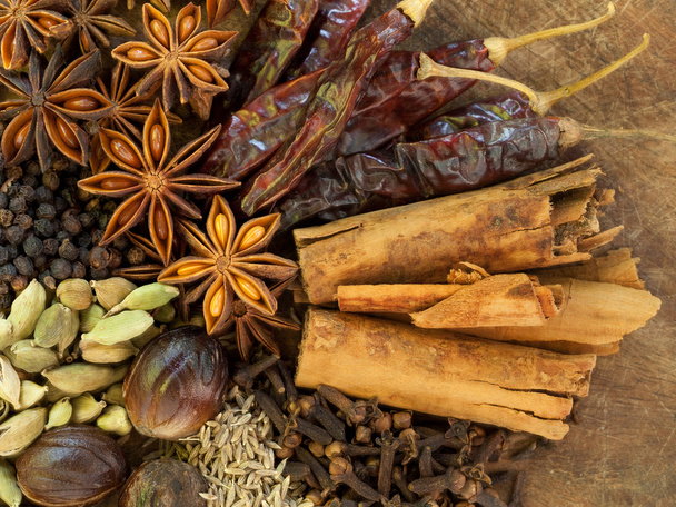 Mixed Spices on a Wood Background - Photo, Image