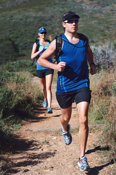 couple trail running together for sport - Fotó, kép