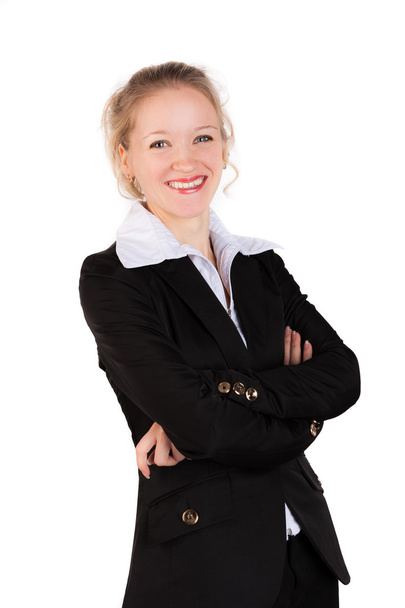 Mulher rindo de terno preto de pé com braços cruzados
   - Foto, Imagem