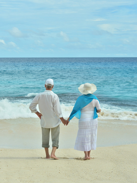 elderly couple rest at tropical resort - Photo, Image