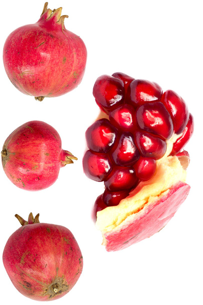 Extremo close up fundo de um suculento vermelho romã madura frui
 - Foto, Imagem