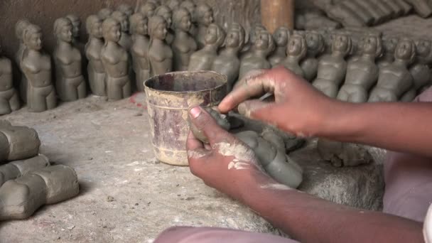 An artist makes clay dolls - Footage, Video