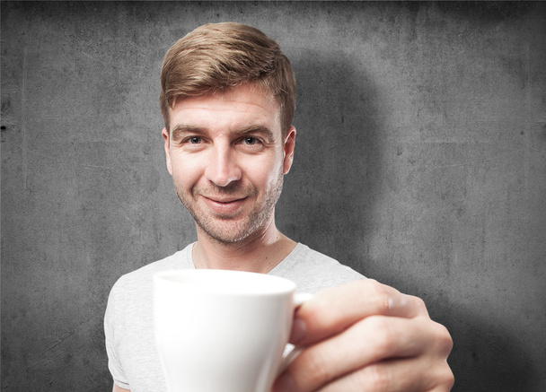 blond man with a coffee - Zdjęcie, obraz