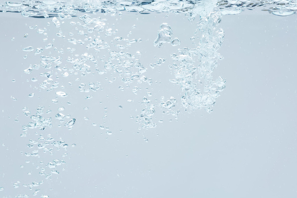 blue bubbles underwater - Foto, afbeelding