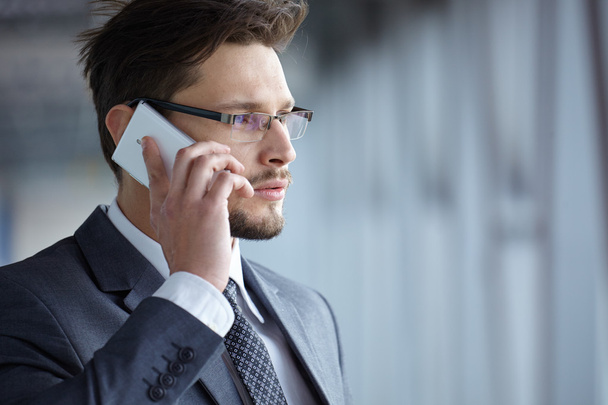 Handsome businessman on the phone - Photo, image