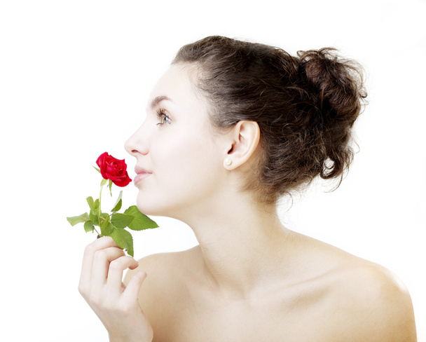 Beautiful girl with a rose - Foto, imagen
