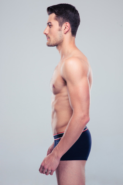 Side view portrait of a muscular man - Foto, Imagen