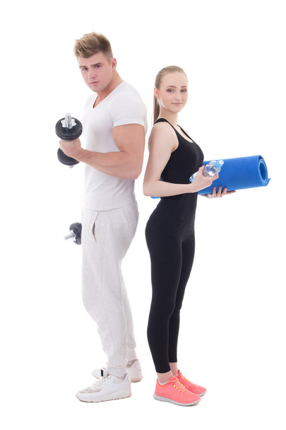 чоловік і жінка в спортивному одязі з гантелі та йога килимок ізольовані
 - Фото, зображення