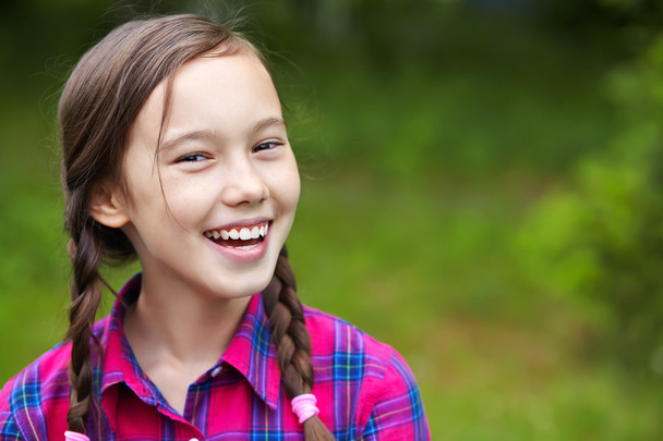 Beautiful smiling teenage girl - Valokuva, kuva