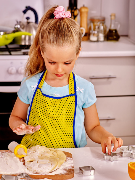 Child knead dough at kitchen. - Valokuva, kuva