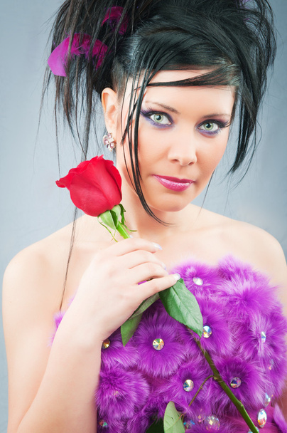 Beautiful bride with rose in studio shooting - Photo, Image