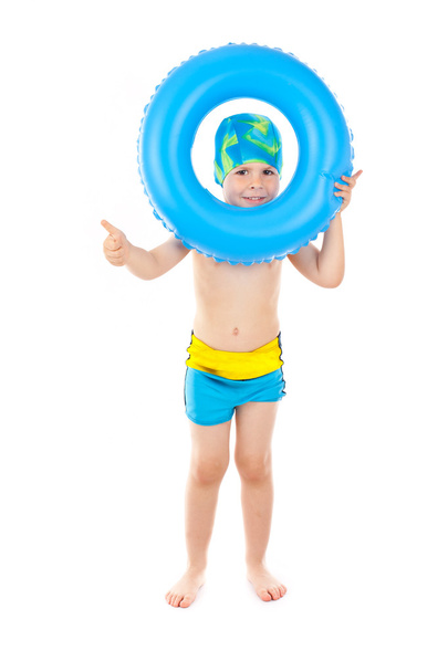 Boy playing with blue life ring - Valokuva, kuva