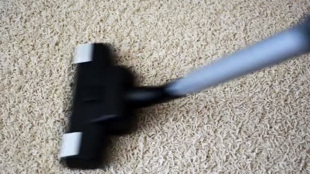 Vacuum cleaner cleaning the carpet. - Footage, Video