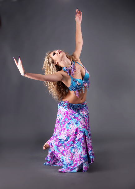Beautiful blond in the active Arab Dance - Photo, Image