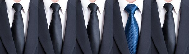 Blue tie between black neckties - Photo, Image