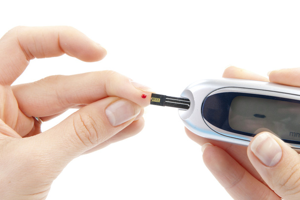 Patient measuring glucose level blood test - Foto, Imagem