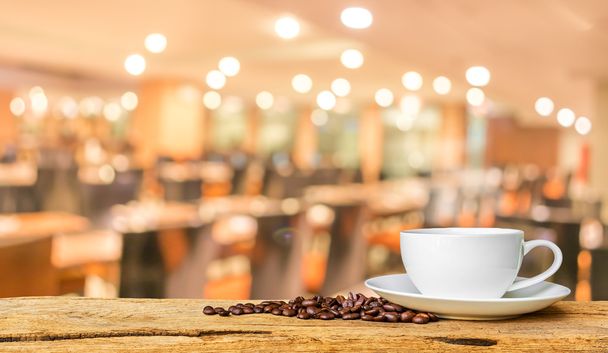 Coffee shop blur background with bokeh image . - Photo, Image