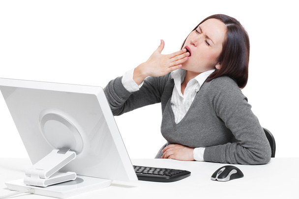 Businesswoman yawning on her workplace - Photo, Image