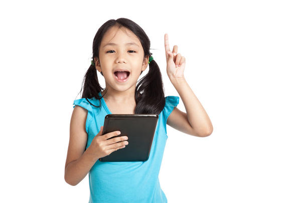 Little asian girl have idea with tablet pc - Photo, Image
