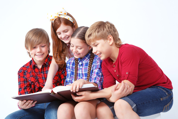 Nice children reading book  - Foto, Imagen