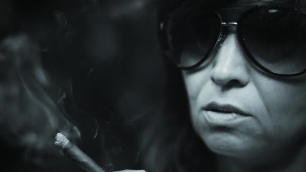 Depressed woman smoking cigarette - Кадри, відео