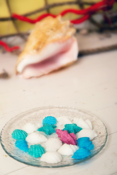 Figurine di zucchero in un piatto di vetro
 - Foto, immagini
