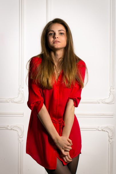 Sexy brunette woman in a red shirt - Zdjęcie, obraz