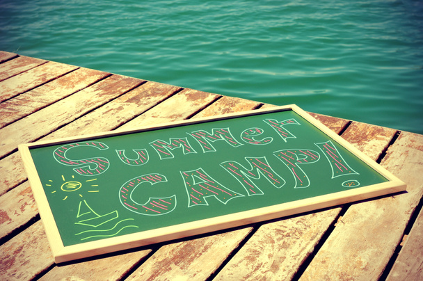 Text summer camp written in a chalkboard - Photo, Image