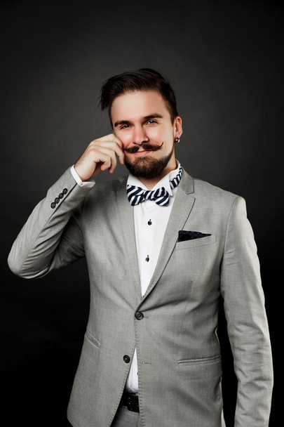 handsome guy with beard and mustache in suit - Photo, image