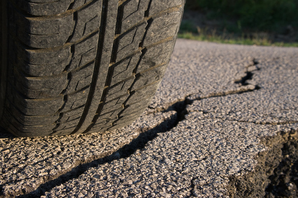 Tire And Cracked Asphalt - Photo, Image