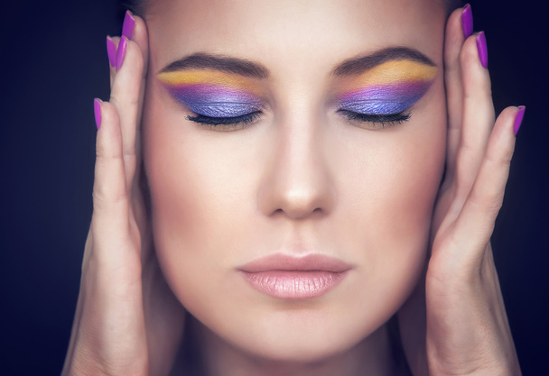 Beautiful woman face with colorful makeup - Photo, Image
