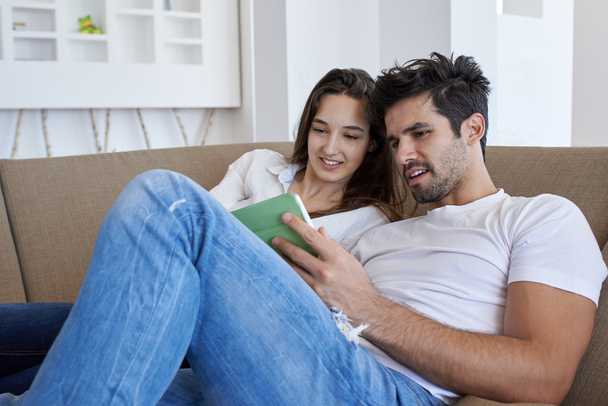 couple at modern home using tablet computer - Photo, Image
