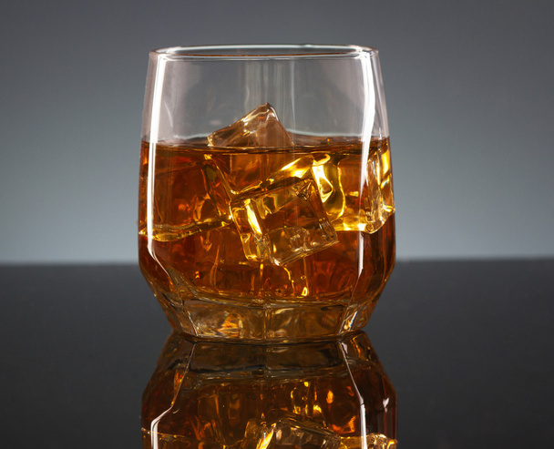 Glass of scotch whiskey and ice  - Fotoğraf, Görsel