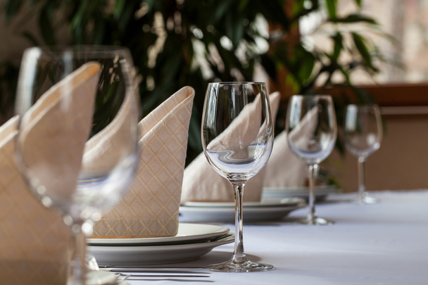 Table set with empty glasses in restaurant - Fotografie, Obrázek
